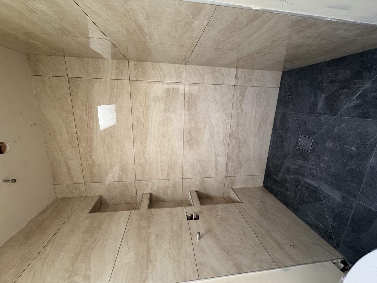 Finished tile shower remodel by Cali Dream Construction